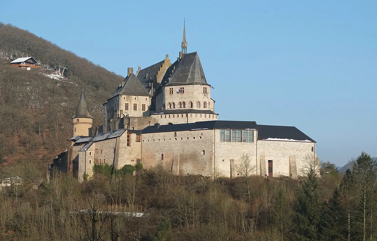 Vianden Castle on a wooded hillside